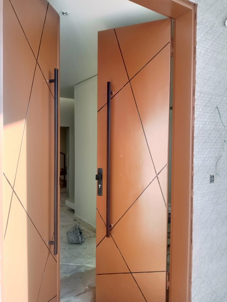 مصنع ابواب حديد وتربزينات واستيل وشبابيك المنيوم و