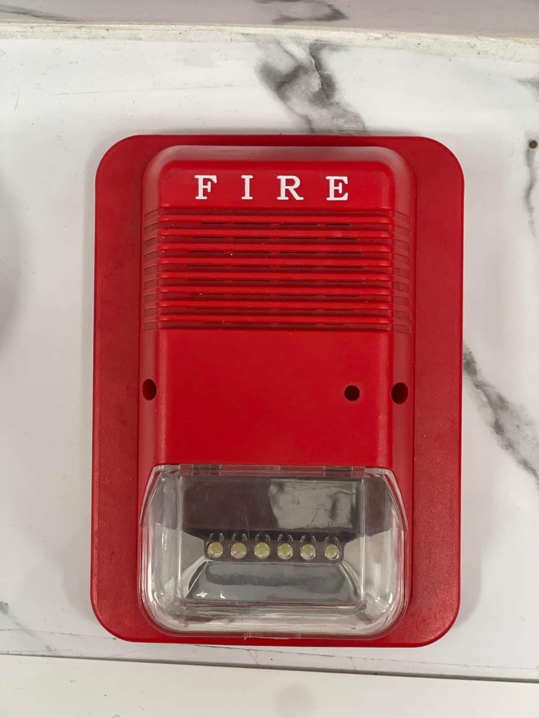 إعادة تعبئة طفايات الحريق وتركيب نظام إنذار الحريق