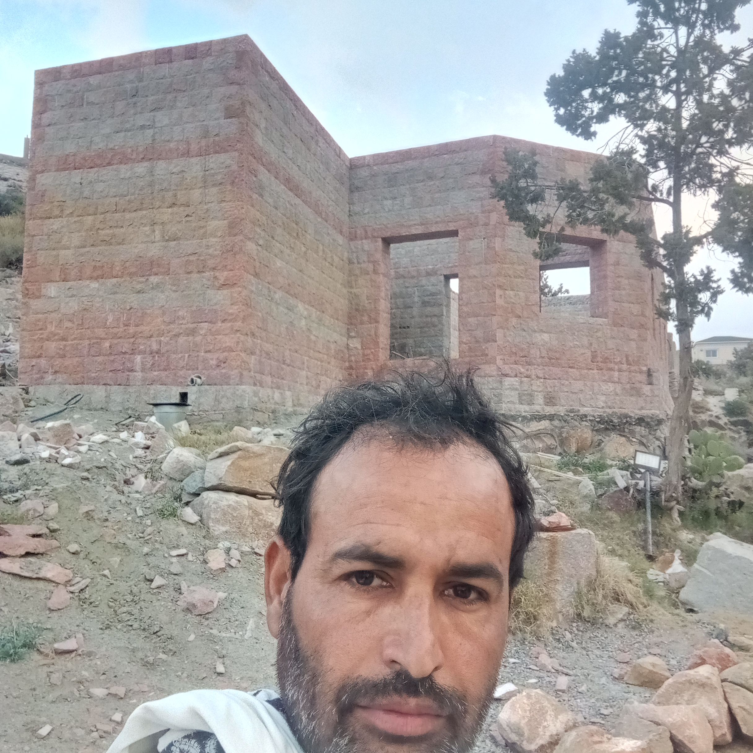 معلم بناء حجر طبيعي مجالس مشبات بيوت