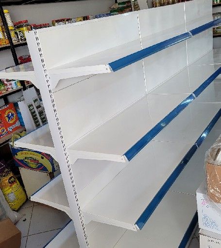 رفوف مستودعات ارفف تخزين منزليه بيت رفوف محلات