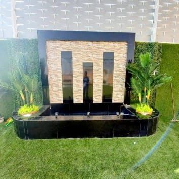 تنسيق الحدايق وزراعة العشب الطبيعي وتركيب العشب ال