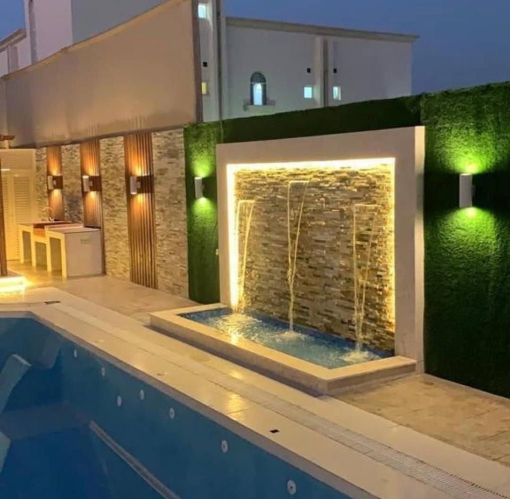 تنسيق الحدايق وزراعة العشب الطبيعي وتركيب العشب ال