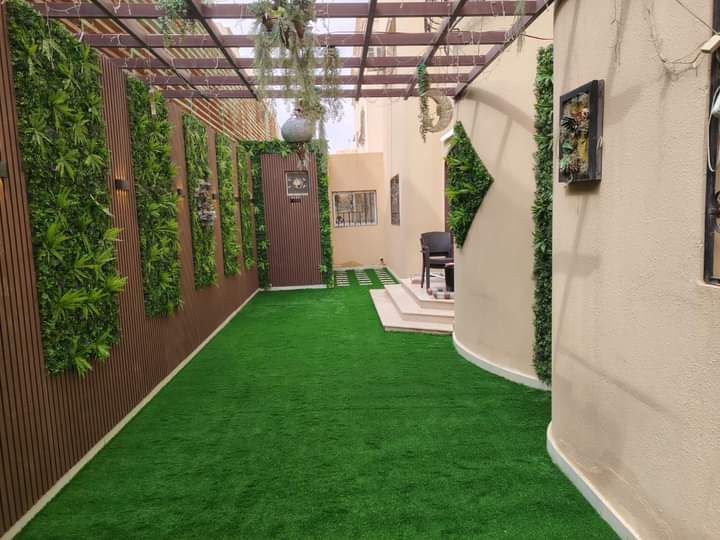 تنسيق حدائق ثيل طبيعي وصناعي