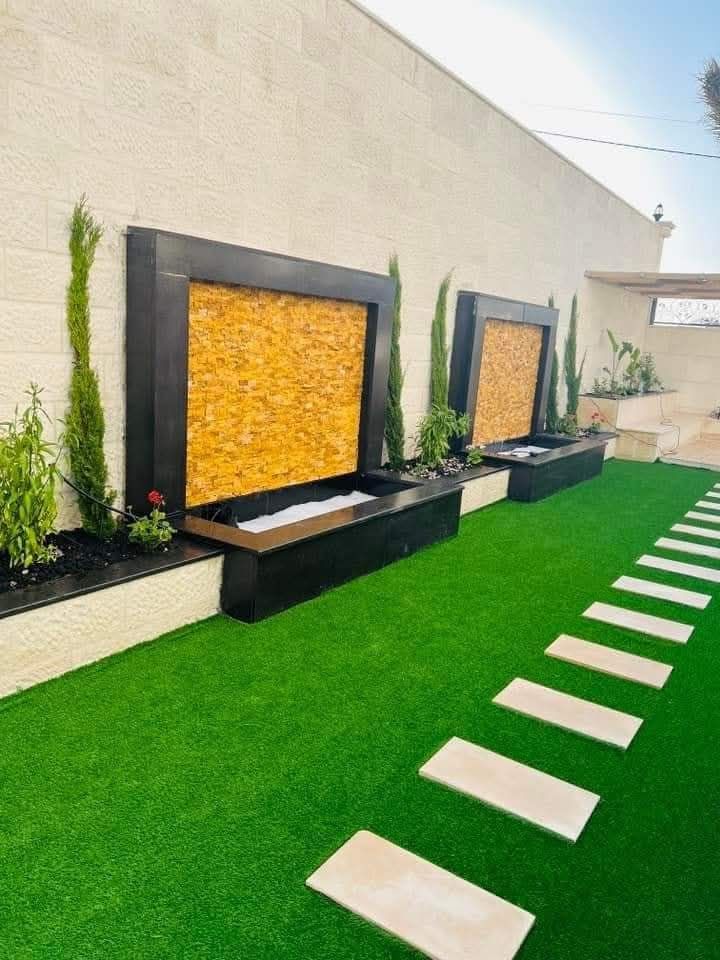 تنسيق حدائق منزلية وتركيب جميع العشب الصناعي والطب
