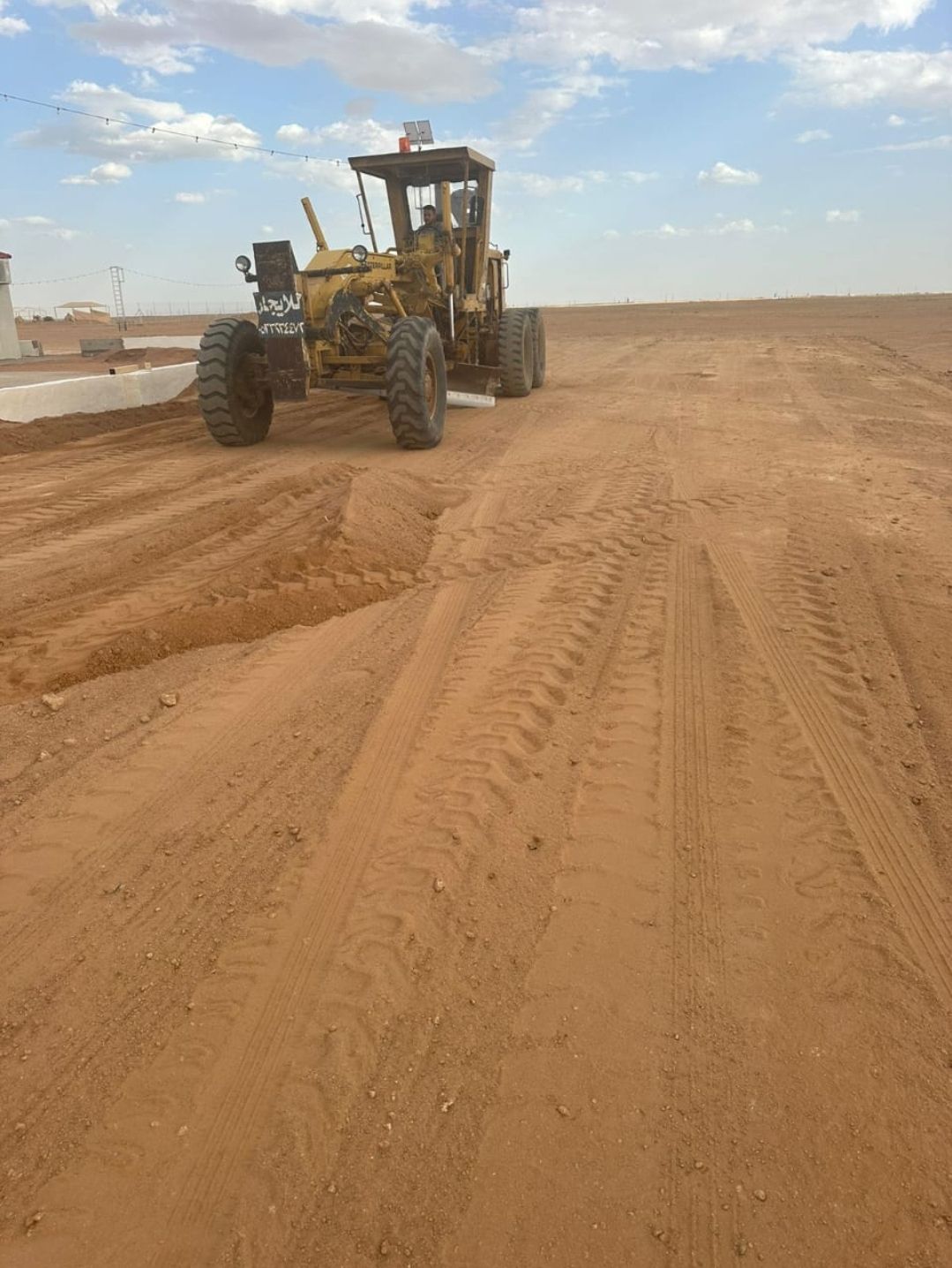 تخطيط مواقف سيارات وأسهم أرشاديه ومواقف ذوي الاحتي