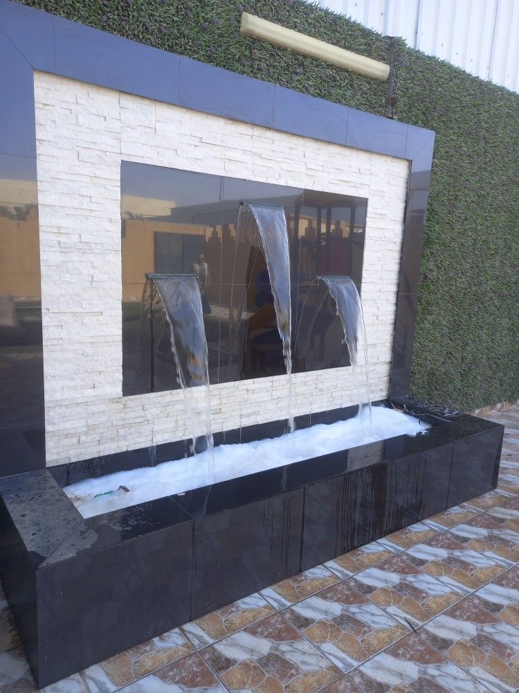 تصميم وتنفيذ الشلالات والنوافير