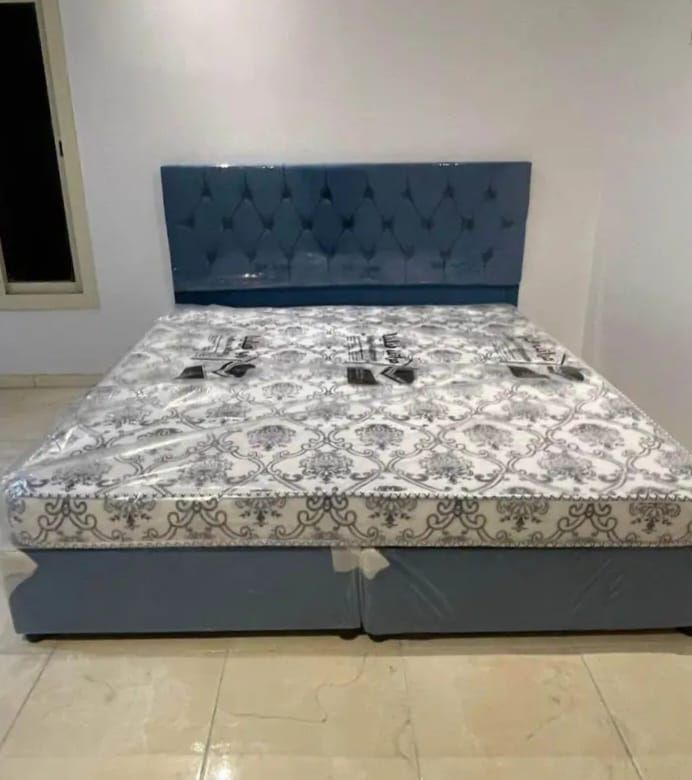 Bed and mattress and wardrobe